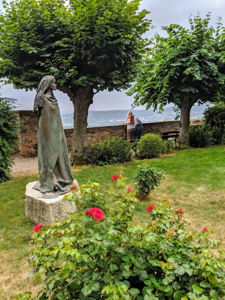A photo of a historical Saint Hildegard statue, at Abbey church she founded at the end of the Hildegard Way.